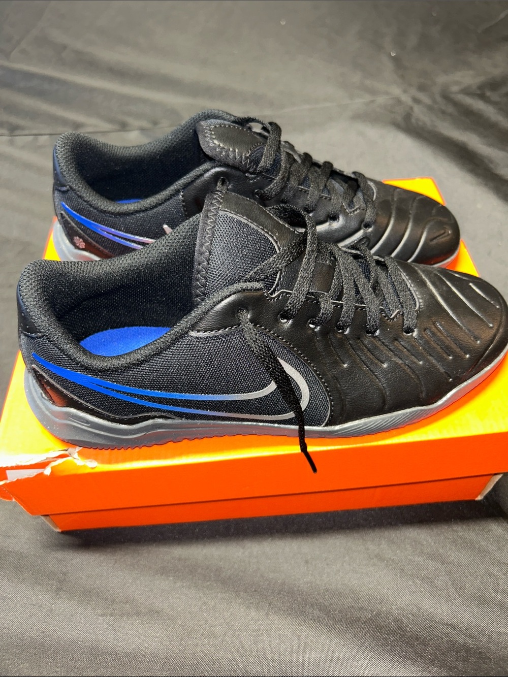 Nike Men’s Black Sneakers with Blue and Silver Accents